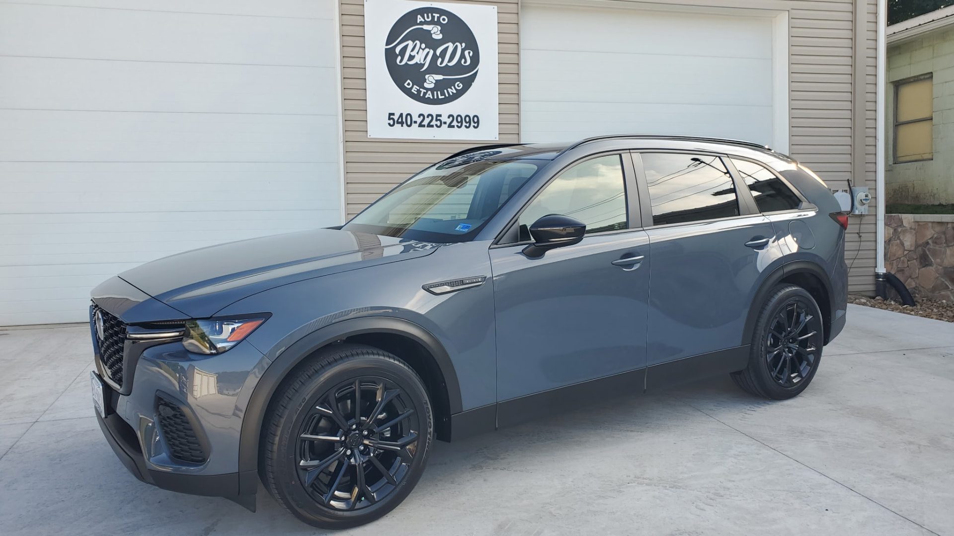 Gray Mazda SUV finished with a ceramic coating at Big D's Auto Detailing