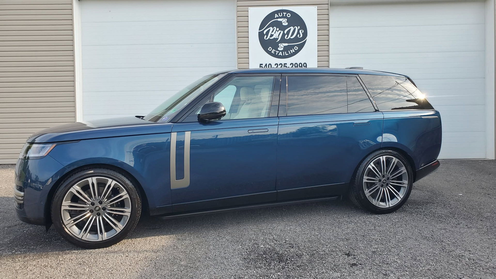 Freshly detailed blue Range Rover at Big D's Auto Detailing